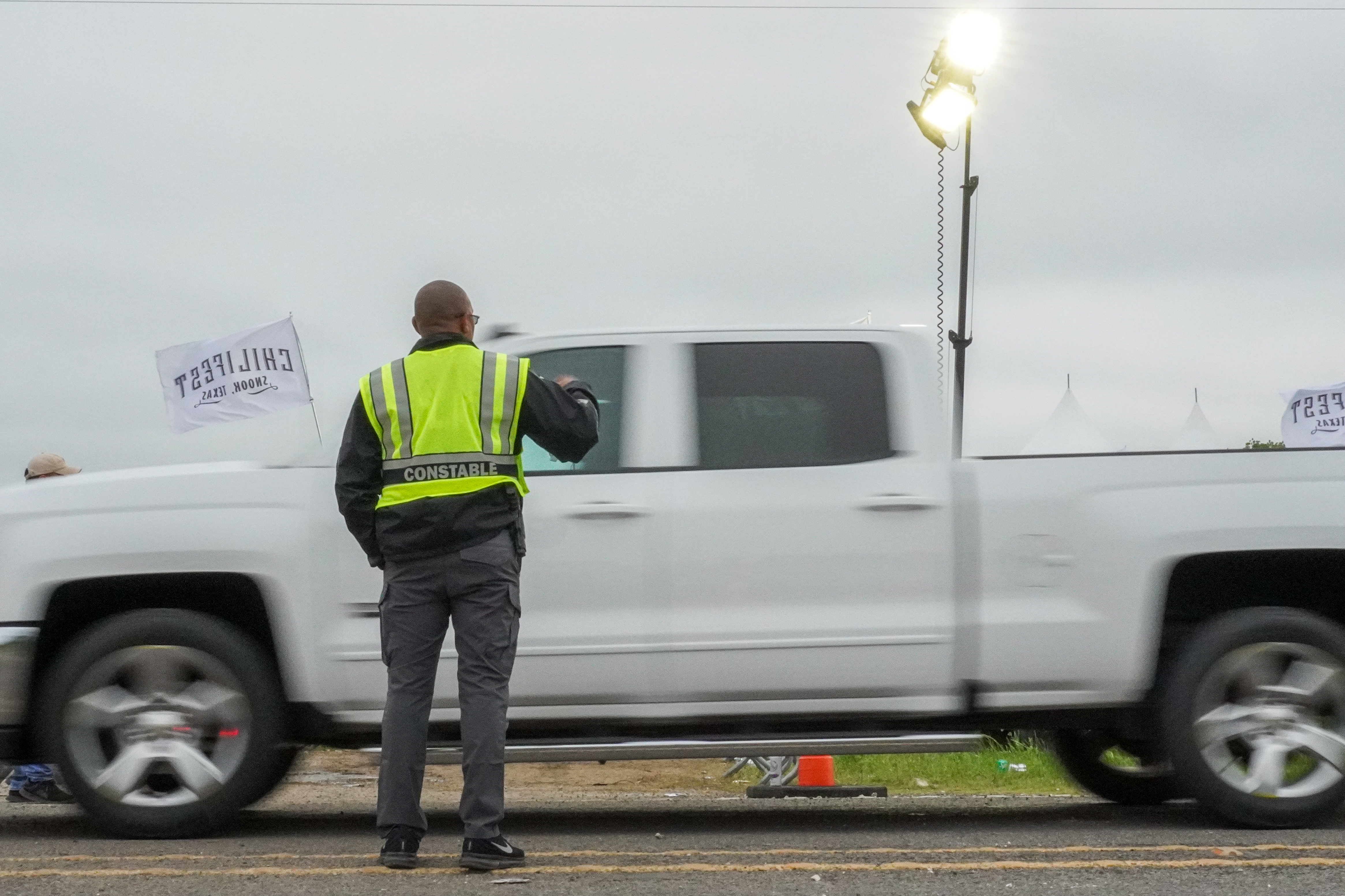 BadgeHire officer directing traffic at an event